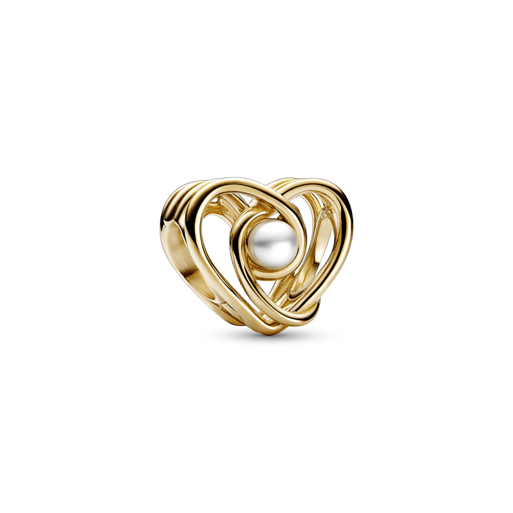 Ažūrinis besisukančios širdelės ir apdoroto gėlo vandens kultivuoto perlo charm - Pandora Lietuva